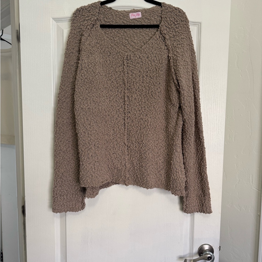 Taupe large oversized sweater.  Has been worn before.